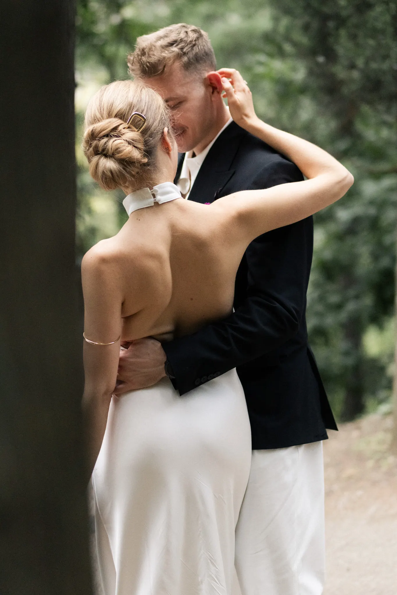 Veronika’s bare back as she embraces Sasha